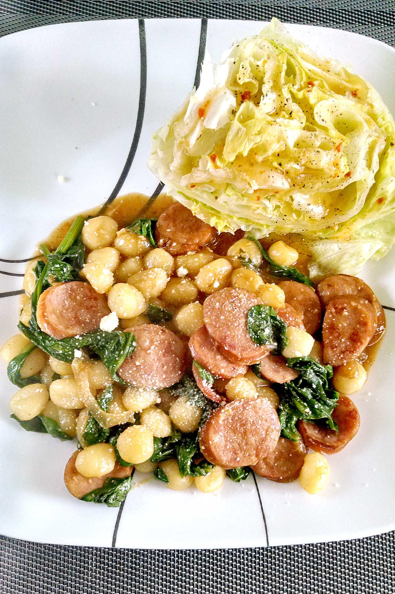 Take your taste buds on a delicious journey with this Gnocchi with Sausage and Spinach dish. The perfect combination of flavors and textures, it's a must-try for all foodies out there! #dinnertime #easyrecipes #italianfood #gnocchilove #italiancomfortfood #sausageandspinach #homemadegnocchi #pastaloversunite