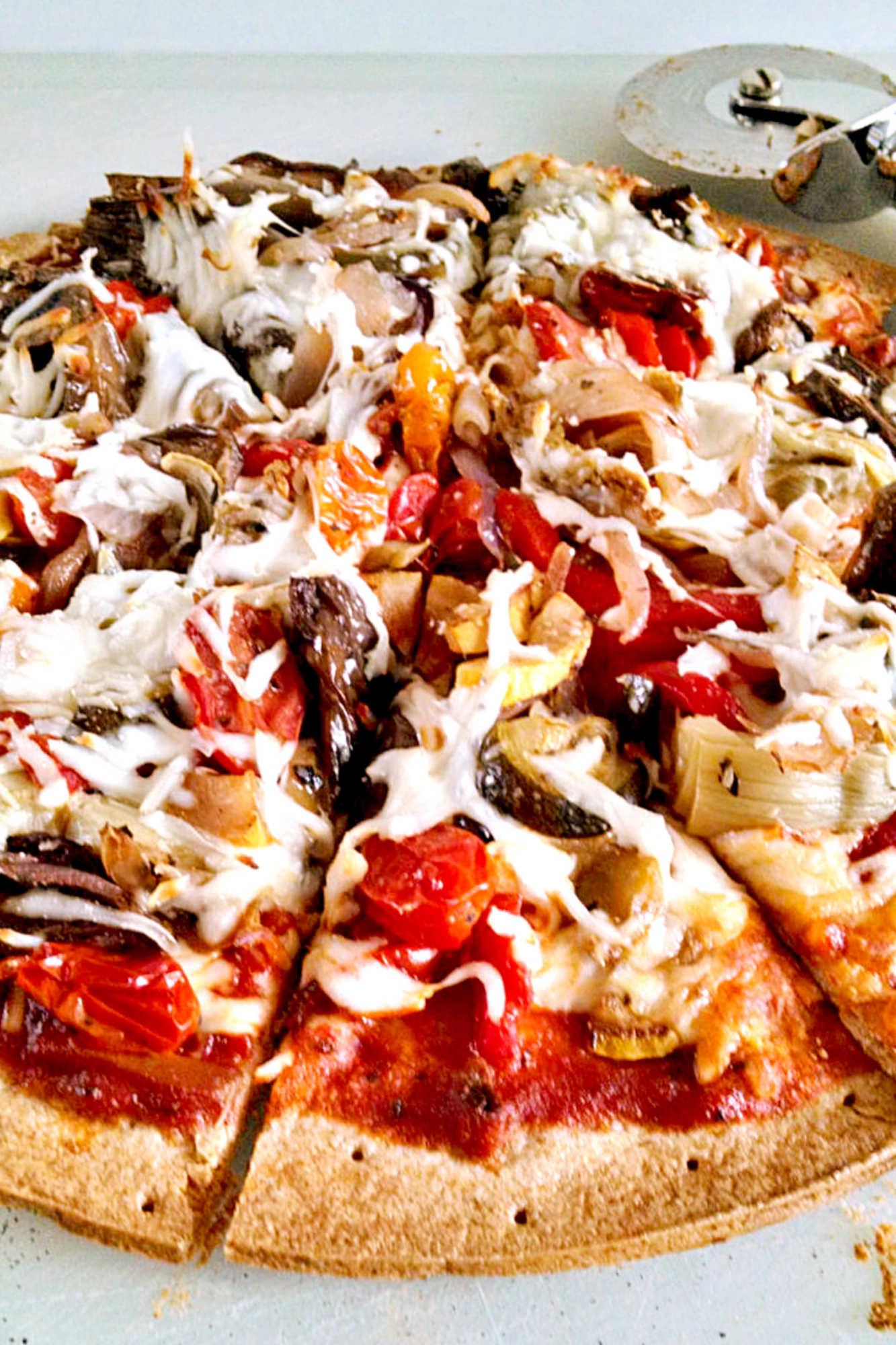 Elevate your pizza game with a delicious and nutritious twist! Try this Roasted Vegetable Pizza provides the best of both worlds with a variety of roasted veggies on a crispy crust. #balancedeating #veggiepizza #yum #homemadepizza #RoastedVeggiePizza #VegetarianPizza #HomemadePizzaNight #PizzaLoversUnite #PizzaGoals