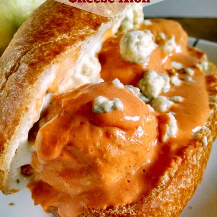 Slow Cooker Buffalo Chicken Meatball Sliders tasty amazing and perfect for any tailgate party. Spicy wing sauce is mixed with cool ranch dressing and poured over these Buffalo chicken meatballs which are slow cooked and perfect for your tailgate party!