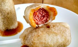 Arepas dough is used to cover hot dog bites in this tasty and healthier version of the traditional corndog!  These Baked Corndog Nuggets are super crispy and extra tasty for your tailgate party.