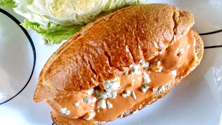 Looking for the perfect game day snack? These buffalo chicken meatball sandwiches will score a touchdown with your taste buds #SlowCookerSliders #BuffaloChickenMeatballs #GameDayEats #CrockPotCooking #EasyAppetizers #SandwichSquad #ComfortFoodCravings #TailgateFavorites