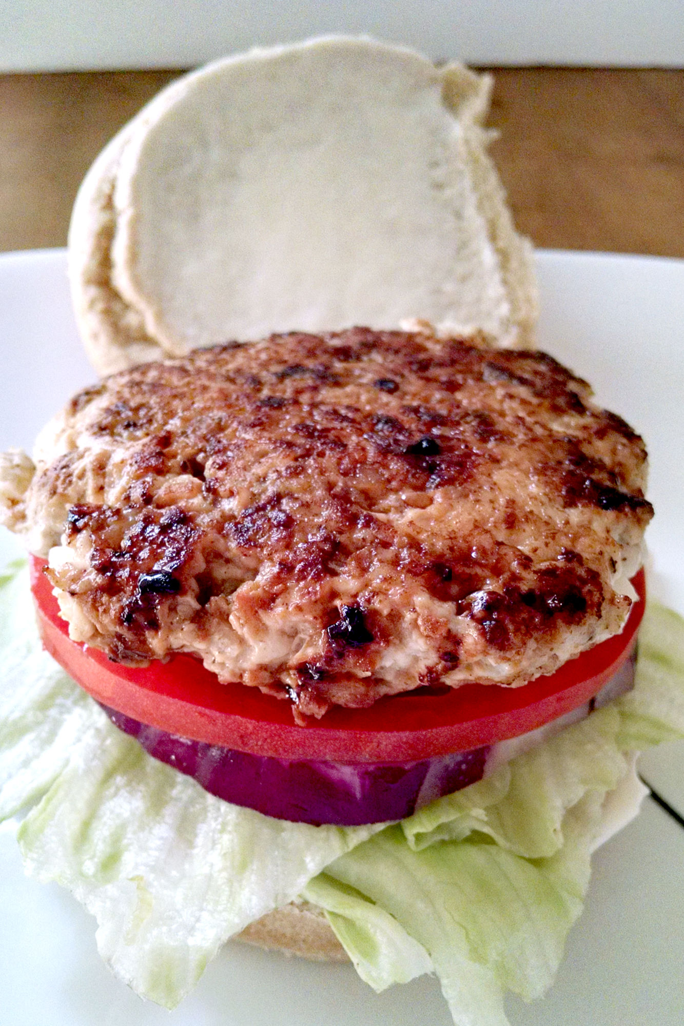 Step up your burger game with our Chicken Apple Brat Burgers - a delicious twist on a classic dish.  Juicy, flavorful and perfect for any summer BBQ or tailgate party. #BurgerMonth #chickenburger #bratburger #bratwurstburger #chickenappleburger #BurgerLoversUnite #GrillMasterFavorites #SummerCookoutEats #ChickenAppleBurgers #BratBurgerDelight #Grillingseasonfavorite #HealthyBurgerOption