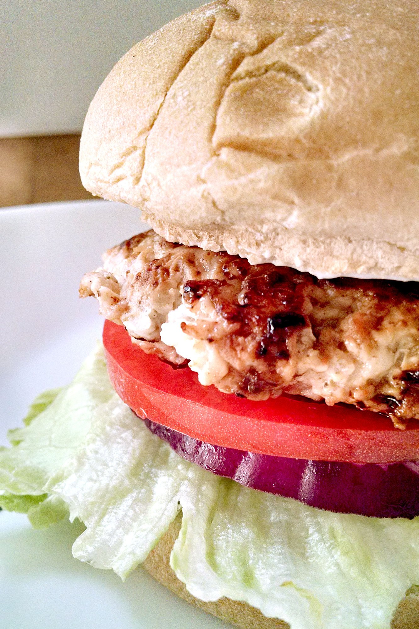 Step up your burger game with our Chicken Apple Brat Burgers - a delicious twist on a classic dish.  Juicy, flavorful and perfect for any summer BBQ or tailgate party. #BurgerMonth #chickenburger #bratburger #bratwurstburger #chickenappleburger #BurgerLoversUnite #GrillMasterFavorites #SummerCookoutEats #ChickenAppleBurgers #BratBurgerDelight #Grillingseasonfavorite #HealthyBurgerOption