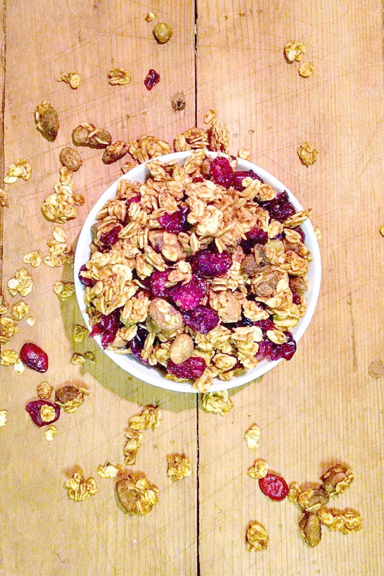 Pumpkin spice and everything nice, this Pumpkin Pistachio Granola is the perfect fall treat! Try it on top of yogurt or by itself for a delicious and healthy snack. #pumpkinpistachiogranola #fallflavors #healthybreakfast #veganrecipes #homemadegranola