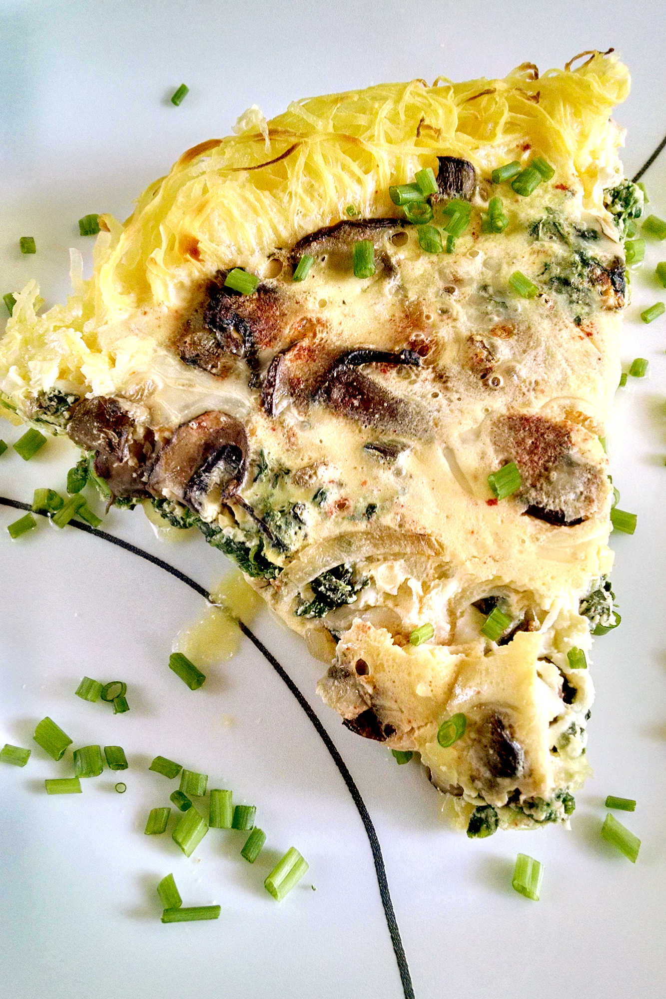 Get your veggies in with this tasty Spinach and Mushroom Quiche with Spaghetti Squash Crust! Perfect for lunch, dinner, or even breakfast! #squashcrust #spinachquiche #mushroomquiche #quicherecipe #Vegetarian #HealthyChoices #FoodBlogger #HealthyEats #VegetarianRecipes #SquashCrust #QuicheLovers #MushroomMadness