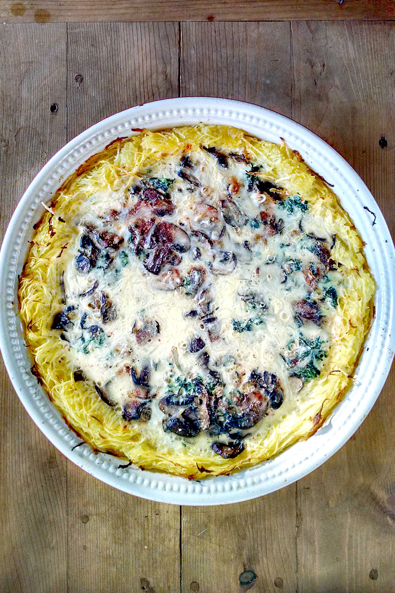 Get your veggies in with this tasty Spinach and Mushroom Quiche with Spaghetti Squash Crust! Perfect for lunch, dinner, or even breakfast! #squashcrust #spinachquiche #mushroomquiche #quicherecipe #Vegetarian #HealthyChoices #FoodBlogger #HealthyEats #VegetarianRecipes #SquashCrust #QuicheLovers #MushroomMadness