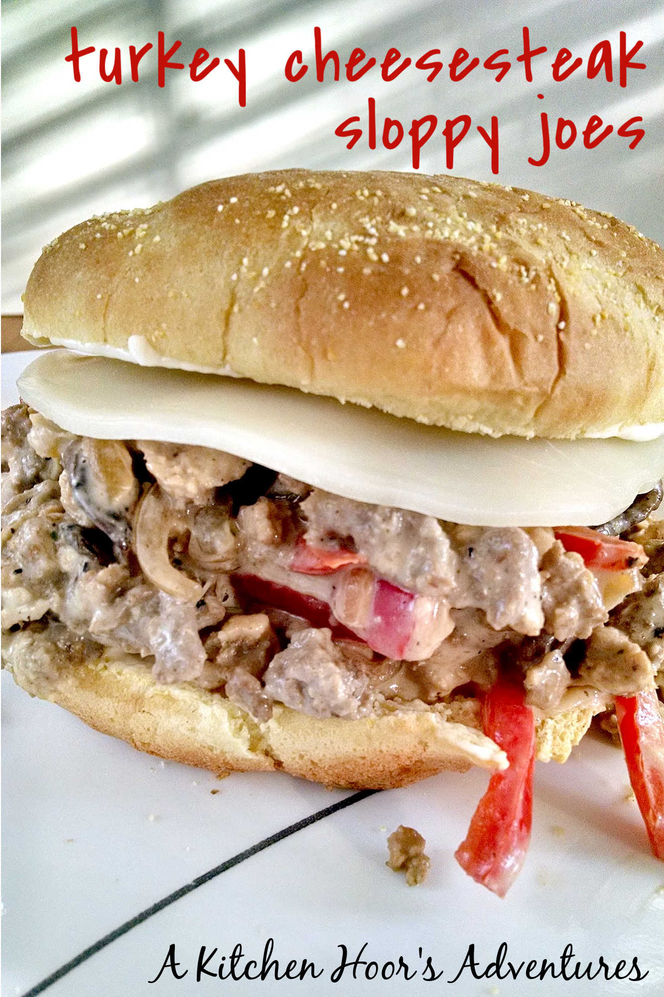 Add a little Philly flair to your next meal with our Turkey Cheesesteak Sloppy Joes. The perfect combination of savory, sweet, and cheesy, you won't be able to resist! #TurkeyCheesesteakSloppyJoes #CheesesteakLovers #FoodieFaves #EasyDinnerIdeas #SandwichObsessed #phillyflavor #weeknightmeal #turkeycheesesteak #sloppyjoes