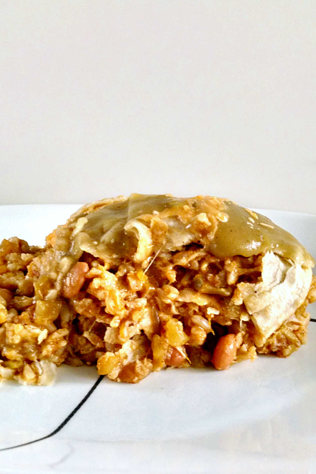 Looking for a new way to use zucchini and pinto beans? This casserole is packed with flavor and nutrients. Perfect for a #meatlessmeal or a side dish!  #MeatlessMondayCasserole #VegetarianComfortFood #HealthyFamilyEats #ZucchiniLovers #PintoBeanPower