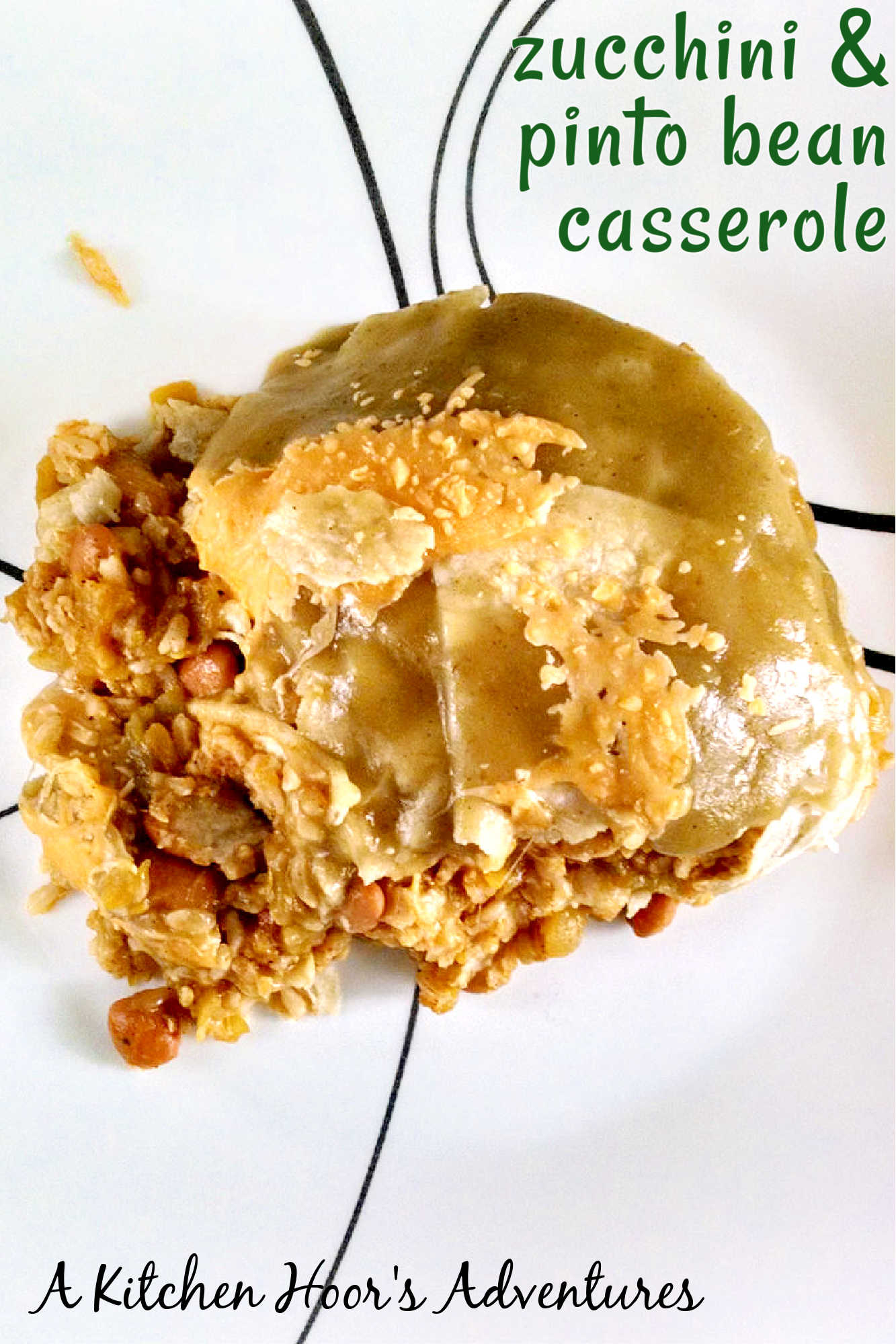 Looking for a new way to use zucchini and pinto beans? This casserole is packed with flavor and nutrients. Perfect for a #meatlessmeal or a side dish!  #MeatlessMondayCasserole #VegetarianComfortFood #HealthyFamilyEats #ZucchiniLovers #PintoBeanPower