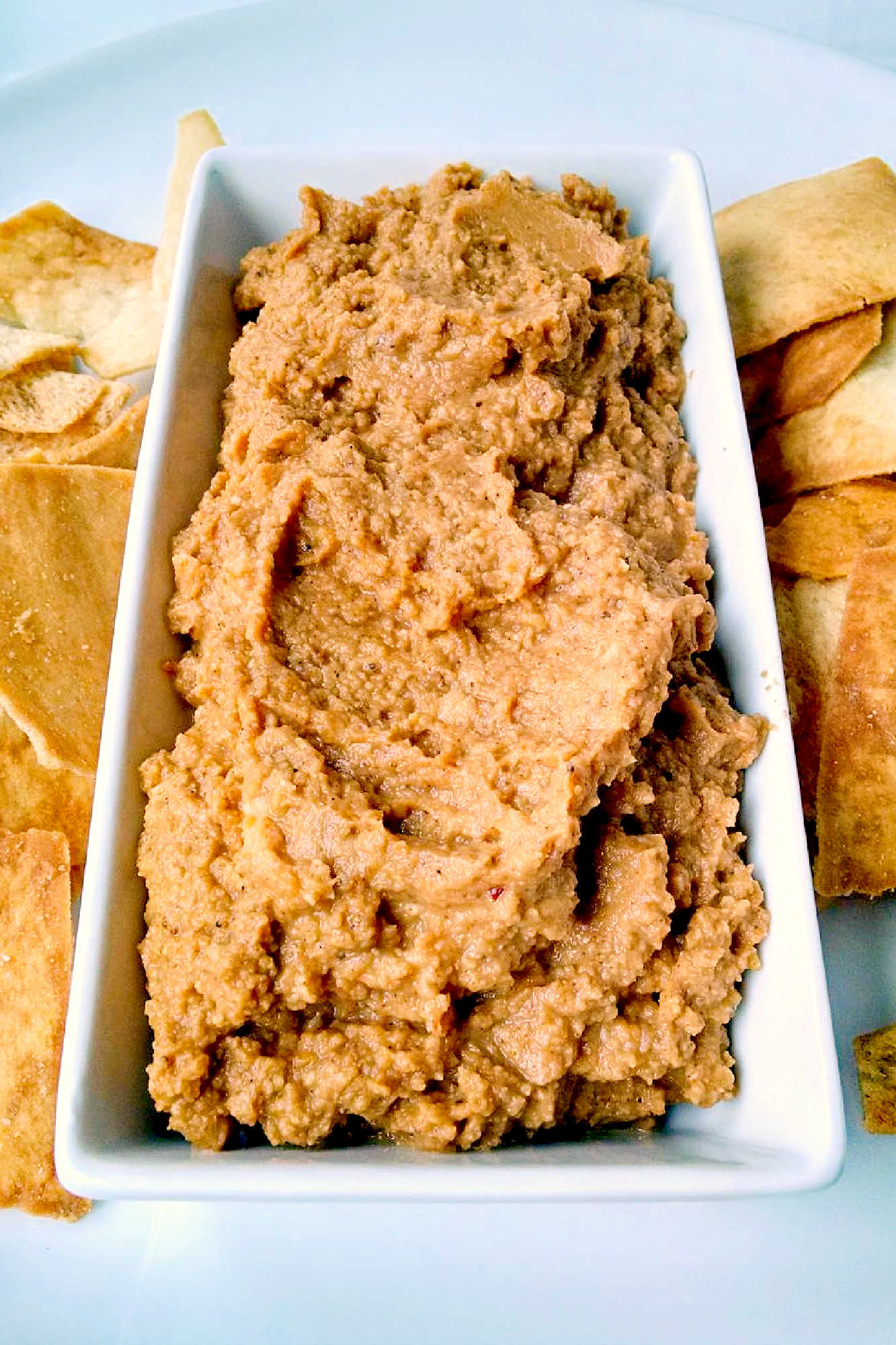 Add a little twist to your traditional pumpkin dishes with our Curried Pumpkin Hummus. Perfect for dipping veggies, pita chips or using as a spread on sandwiches. Trust us, it's worth a try!  #PumpkinHummus #FallFlavors #HealthySnacking #VegetarianRecipes #SavoryDips
