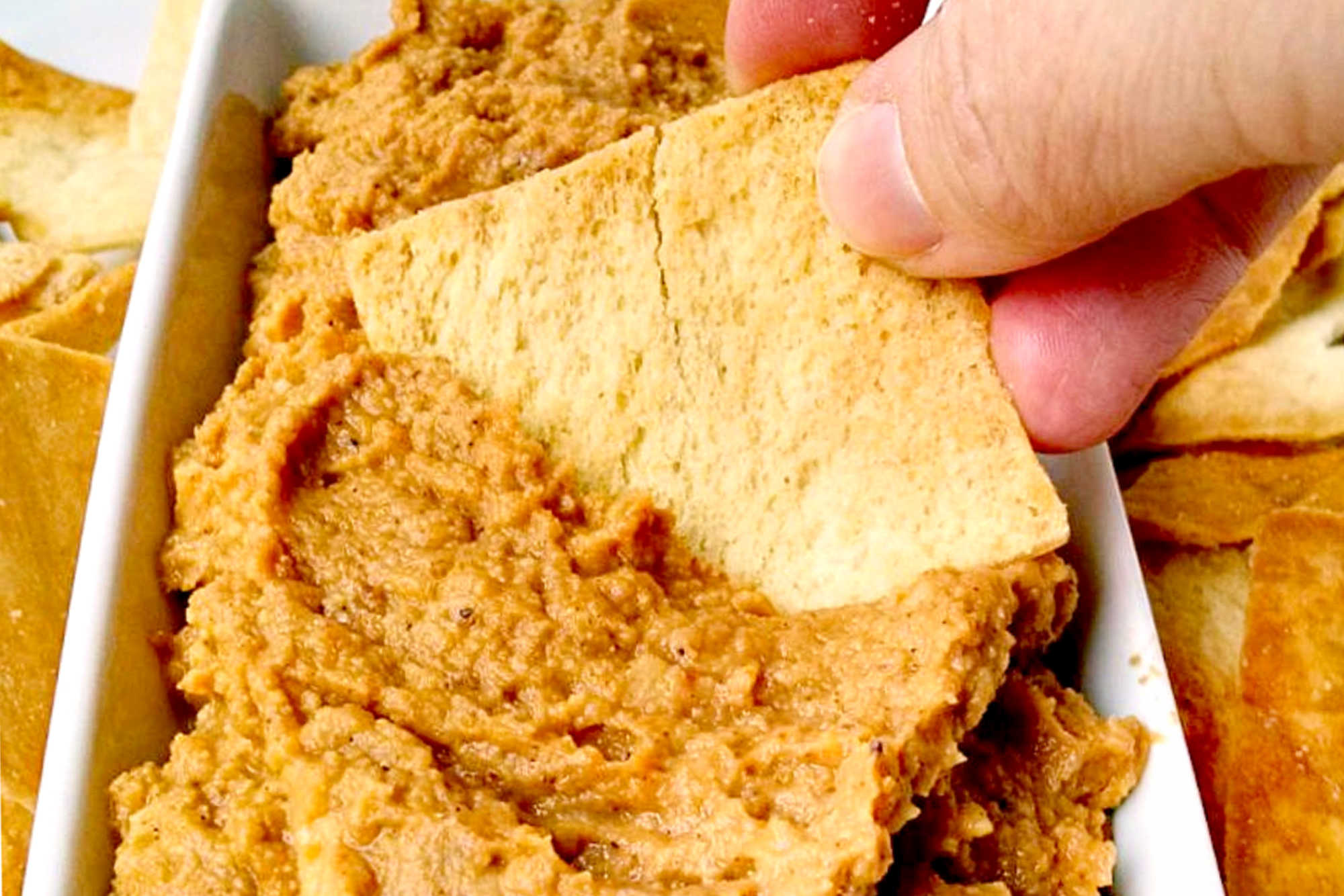 Add a little twist to your traditional pumpkin dishes with our Curried Pumpkin Hummus. Perfect for dipping veggies, pita chips or using as a spread on sandwiches. Trust us, it's worth a try!  #PumpkinHummus #FallFlavors #HealthySnacking #VegetarianRecipes #SavoryDips