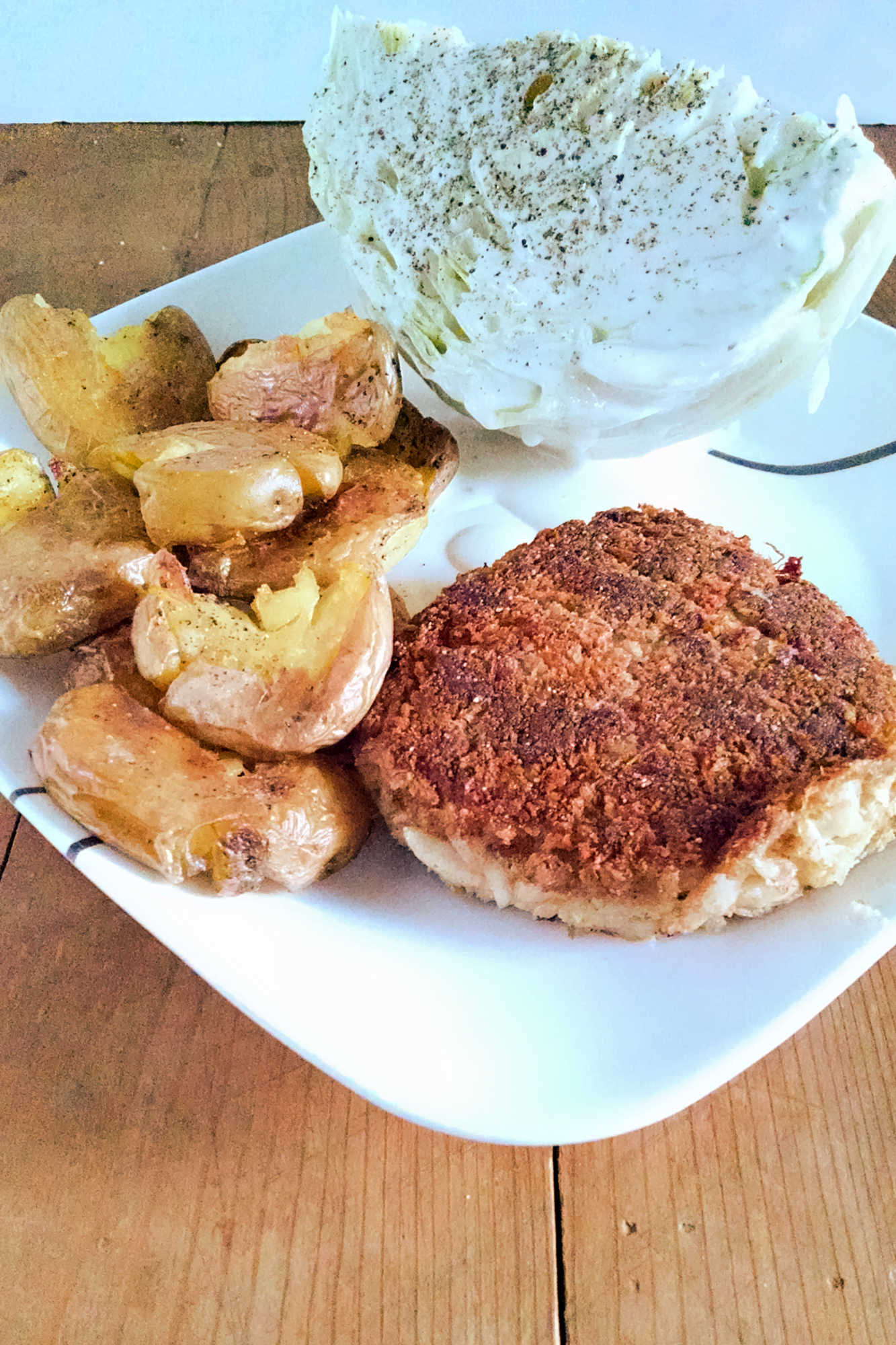 Satisfy your cravings with our Parmesan crusted crab cakes and crispy smashed potatoes. A perfect balance of flavors and textures that will transport your taste buds to a whole new level! #CrabCakes #ParmesanCrust #PotatoRecipes #SeafoodEats #FoodieFaves #foodadventures #crablove #potatogoals
