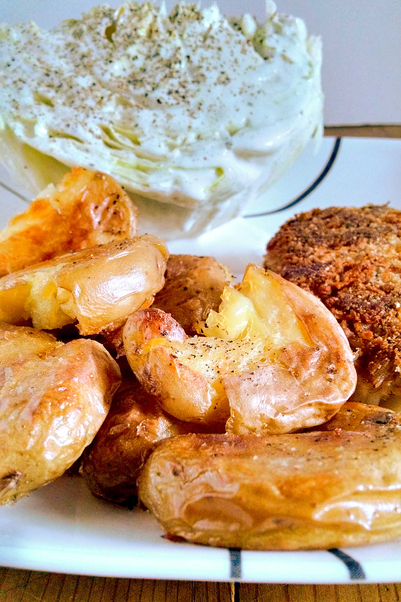 Satisfy your cravings with our Parmesan crusted crab cakes and crispy smashed potatoes. A perfect balance of flavors and textures that will transport your taste buds to a whole new level! #CrabCakes #ParmesanCrust #PotatoRecipes #SeafoodEats #FoodieFaves #foodadventures #crablove #potatogoals