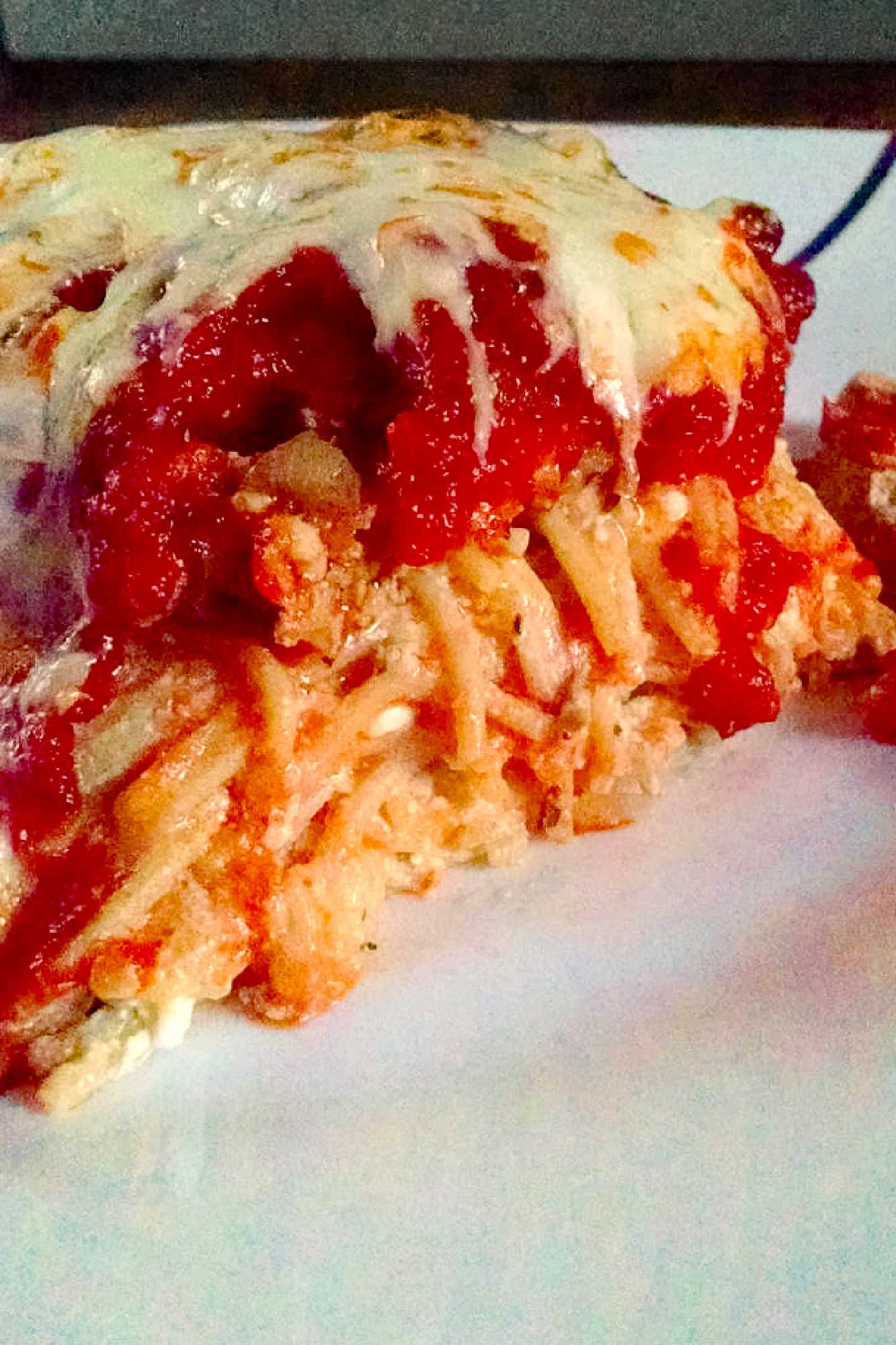 Have some leftover spaghetti? Transform it into a delicious Spaghetti Pie for a creative and budget-friendly meal #SpaghettiPieDelight #PastaPerfection #ComfortFoodGoals #CheesyGoodness #ItalianEatsDaily