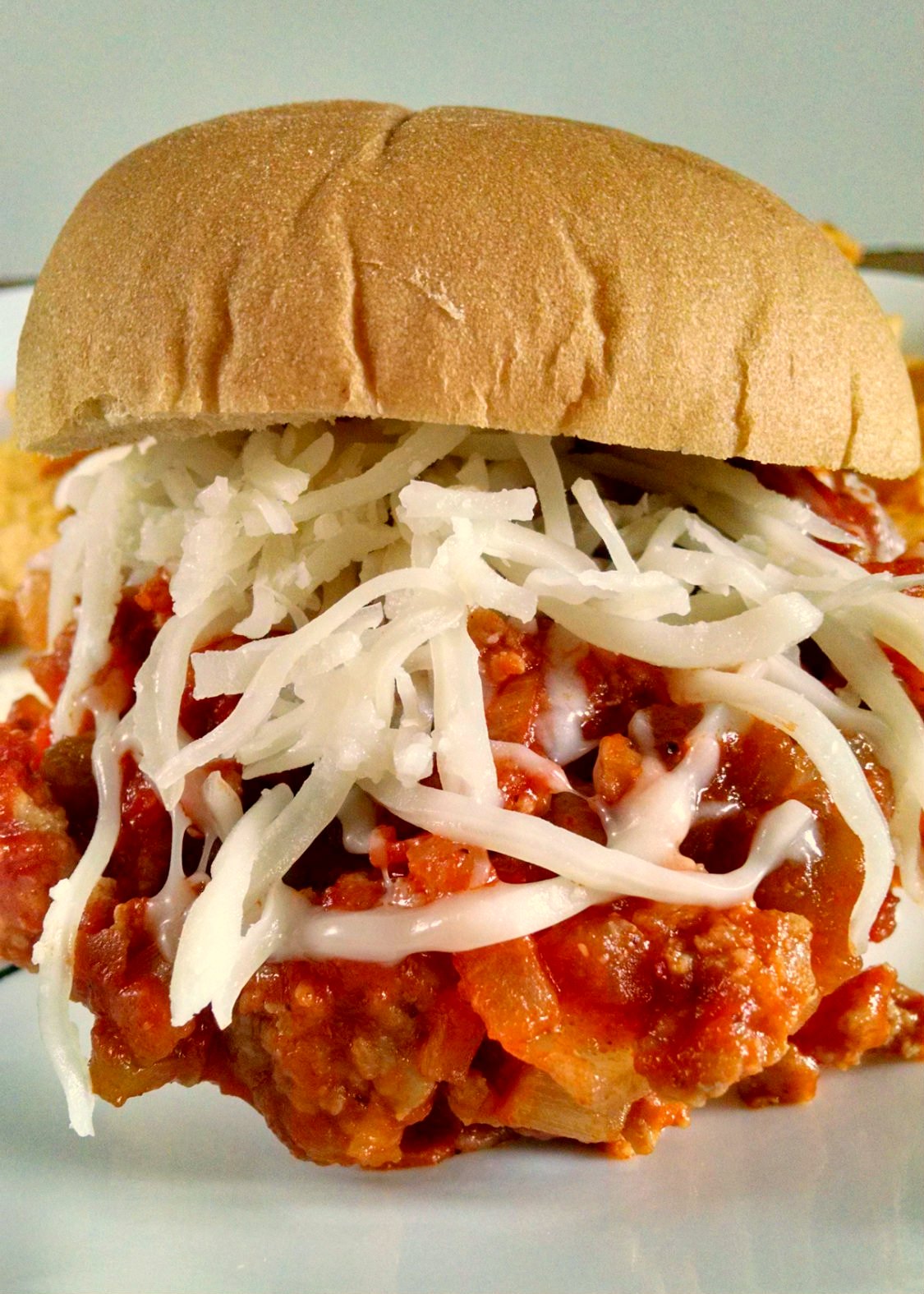 Using turkey sausage and pepperoni along with healthy peppers and onions, these Supreme Pizza Sloppy Joes will not only be your kids favorite, but since they're healthy, they'll be yours as well!