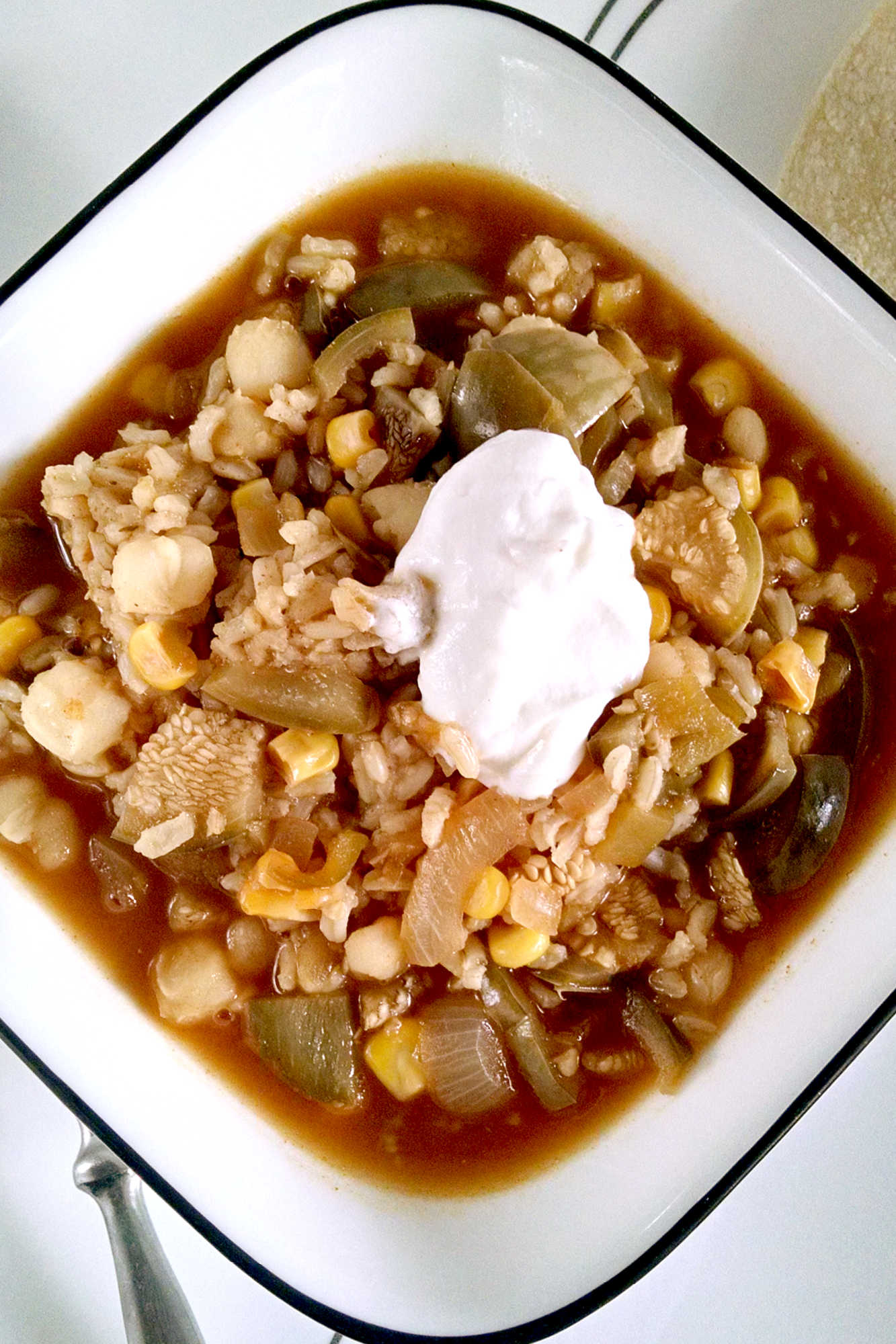 Who says vegetarian meals have to be boring? This Thai Eggplant Posole is bursting with flavor and sure to satisfy any craving. #ThaiEggplantPosole #VeganSoupInspo #SoupySaturdays #HealthyEatingThaiStyle #PlantBasedComfortFood