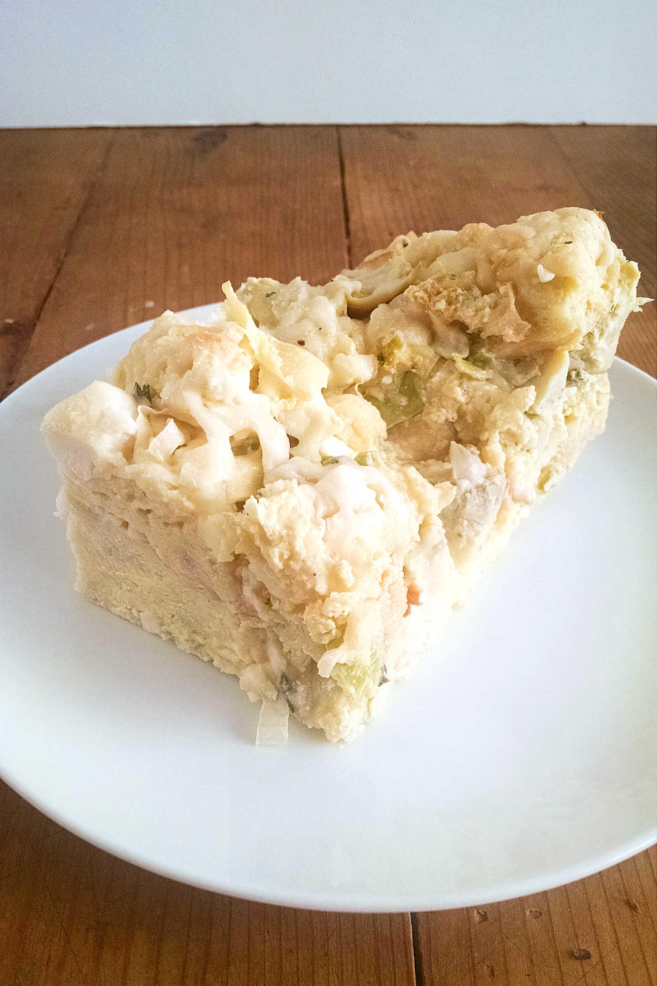 Indulge in the ultimate savory breakfast treat with this Artichoke and Leek Strata! Crispy bread, creamy cheese, and flavorful veggies all in one dish. Brunch goals achieved. #breakfastgoals #savorystrata #artichokeandleek #ArtichokeAndLeekStrata #SavoryBrunchFavorites #EggCasseroleLove #VegetarianBrunchIdeas #EasyMakeAheadMeals