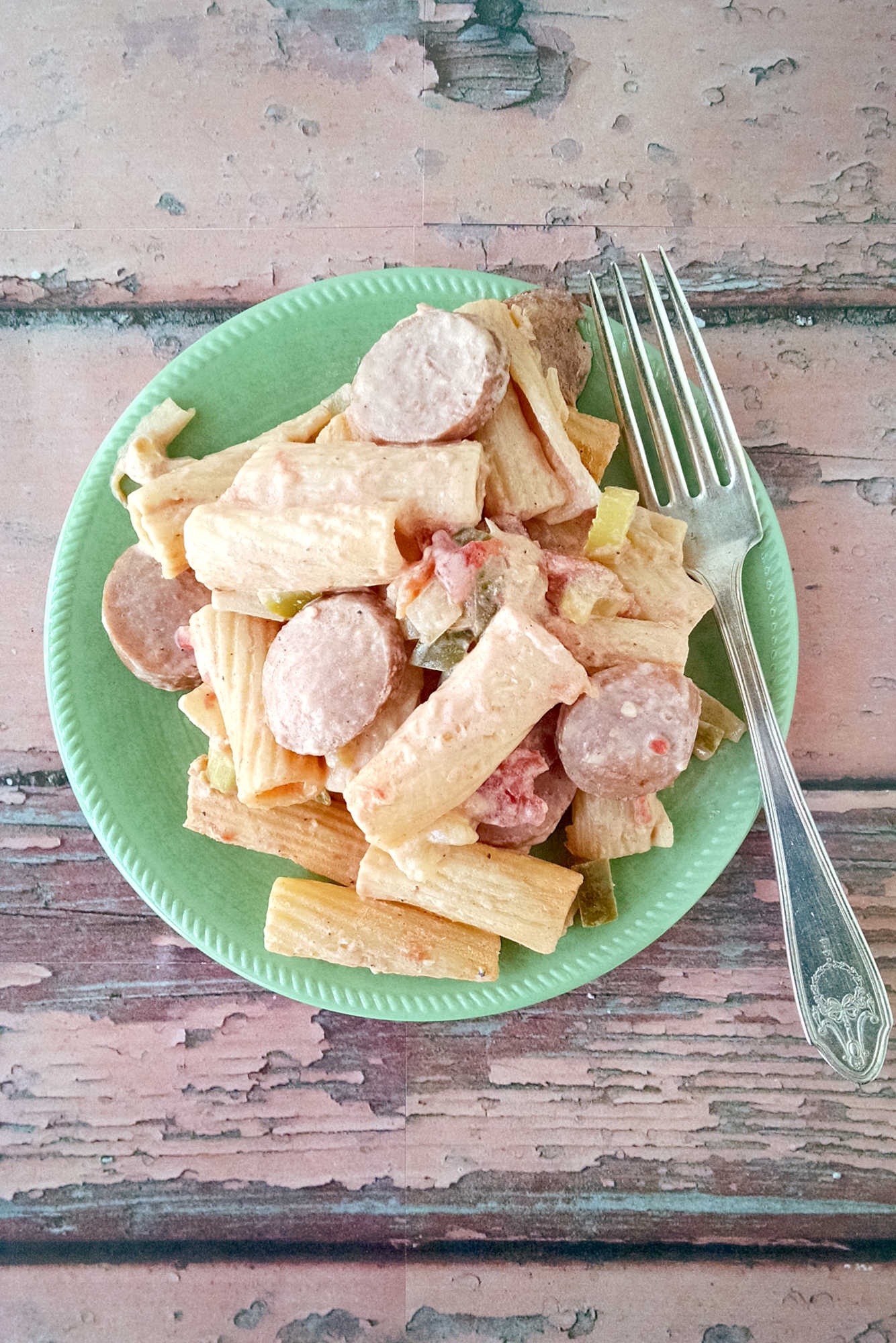 Spice up your pasta night with Creamy Cajun Pasta with Sausage! This flavorful dish is sure to impress and will become a family favorite in no time. #pasta #cajunfood #familydinner #creamycajunpasta #sausagepasta #comfortfoodcreations #spicyfoodie #foodpornheaven