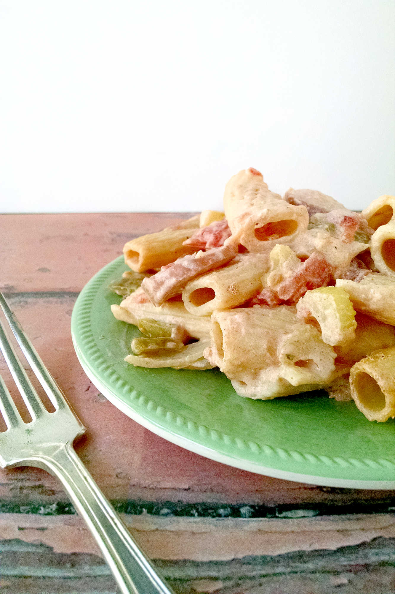 Spice up your pasta night with Creamy Cajun Pasta with Sausage! This flavorful dish is sure to impress and will become a family favorite in no time. #pasta #cajunfood #familydinner #creamycajunpasta #sausagepasta #comfortfoodcreations #spicyfoodie #foodpornheaven