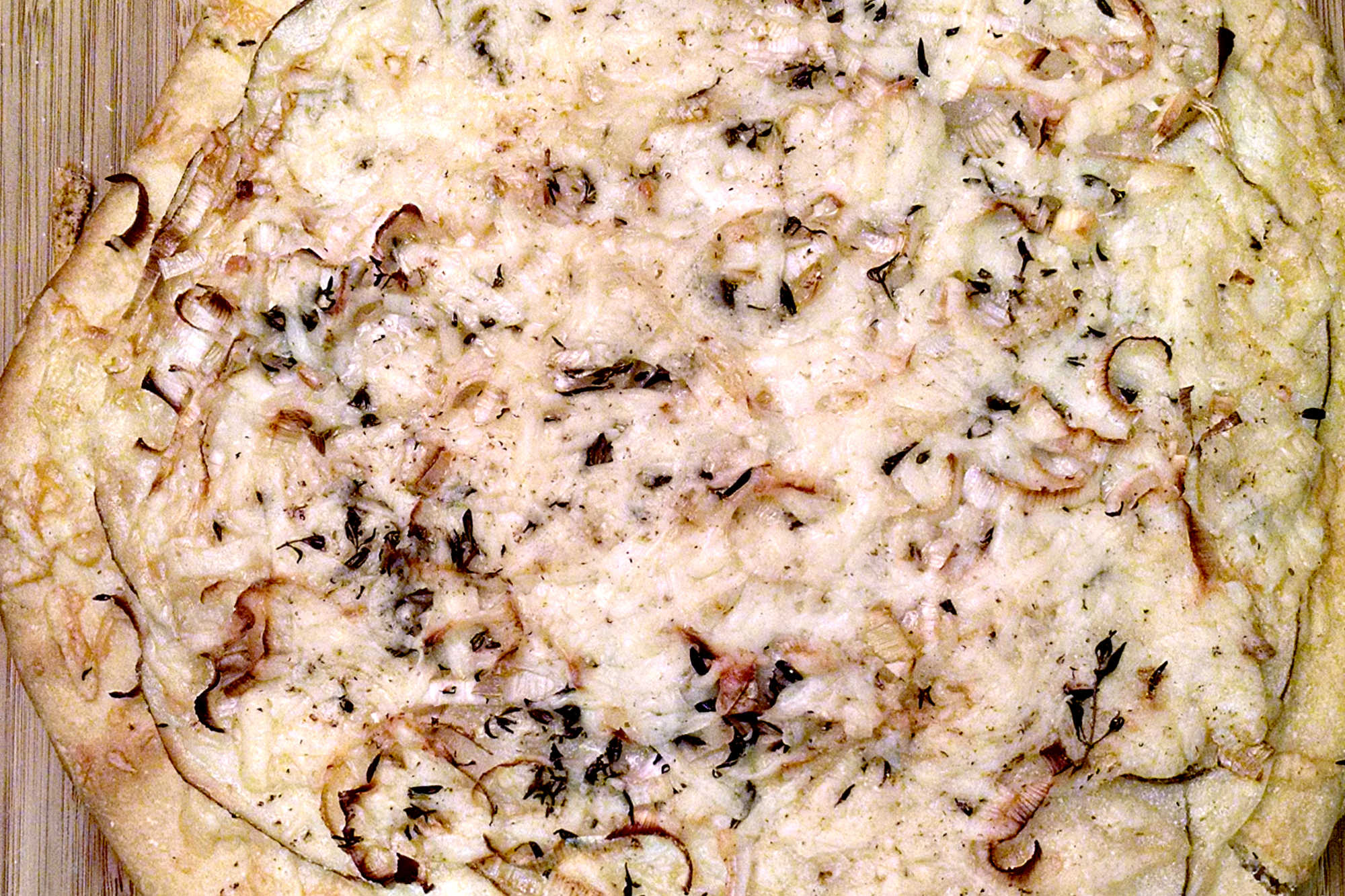 Move over, traditional toppings! It's time to try our Potato Leek Pizza 🚀 A delicious twist on a classic with a creamy base of leeks and potatoes. Are you brave enough to take a bite?  #pizza #leek #potatoleekrecipe #pizzarecipe #meatless #potatoleekpizza #homemadepizza #pizzaloversunite #vegetarianeats #foodfromthegarden #MashupRecipe #PizzaRevolution