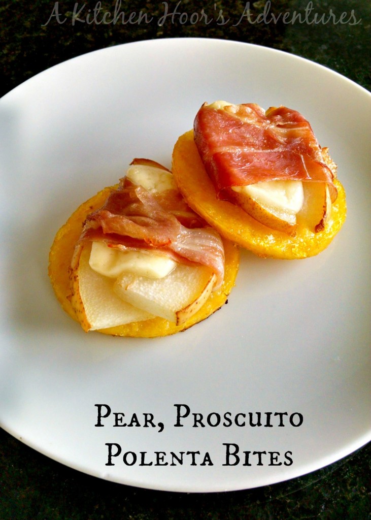 Pear, Proscuitto, Polenta Bites | A Kitchen Hoor's Adventures | Polenta rounds are baked until crisp then topped with pears wrapped in prosciutto and baked until the prosciutto is crisp