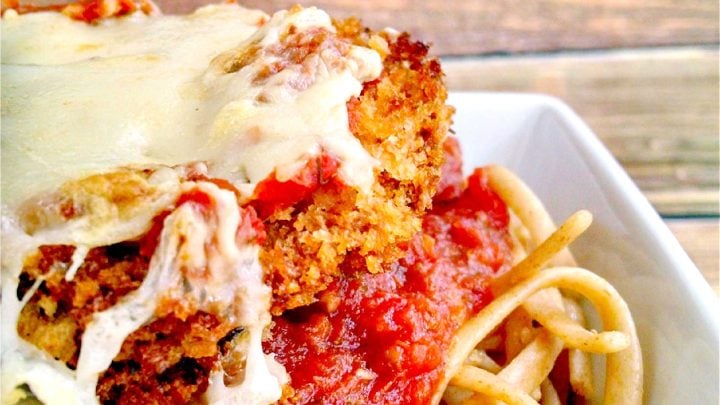 Discover the perfect blend of crispy and cheesy with this mouth-watering Baked Eggplant Parmesan recipe. It's a great way to sneak in veggies! #eggplant #eggplantParm #Parmrecipe #meatless #meatfree #BakedEggplantParmesan #MeatlessMonday #VegetarianRecipes #HealthyEating #ItalianFoodLove