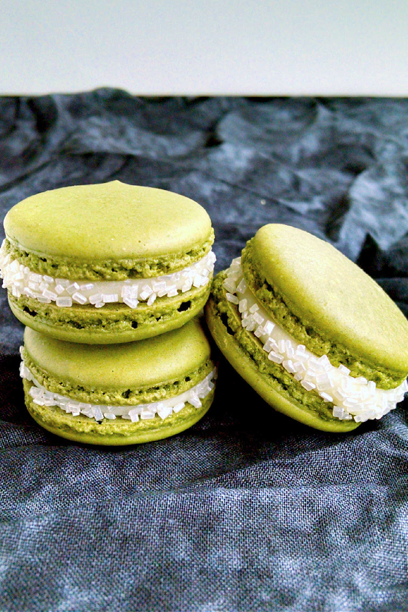Indulge in the sweetness of summer with a Peach Green Tea Macaron. Perfect for tea time or a mid-day treat! #MacaronLoversUnite #FruityFrenchTreats #DelicateDesserts #PeachyPerfection #TeaTimeTreats