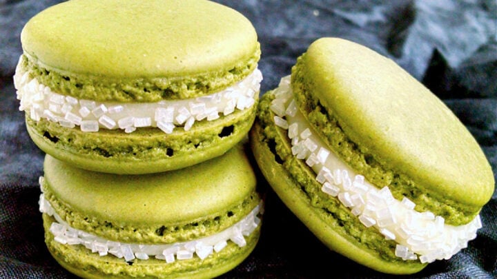 Indulge in the sweetness of summer with a Peach Green Tea Macaron. Perfect for tea time or a mid-day treat! #MacaronLoversUnite #FruityFrenchTreats #DelicateDesserts #PeachyPerfection #TeaTimeTreats