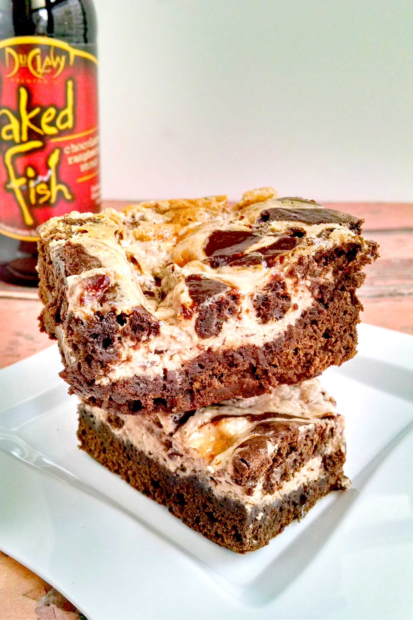 Who says beer and dessert don't mix? 🍺🍫🍓Satisfy both cravings with Swirled Raspberry Stout Brownies. Get ready to fall in love with the perfect balance of sweet and rich flavors.  #StoutBrownies #RaspberrySwirl #BeerDessert #CraftBeerTreats #DessertPairings