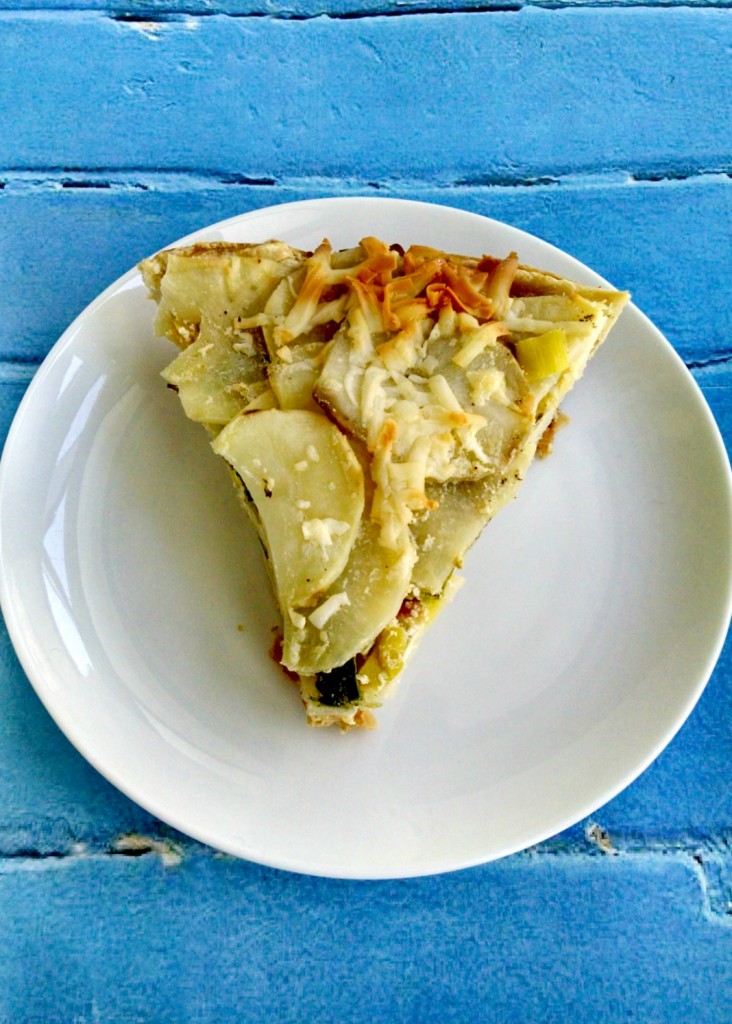 A Kitchen Hoor’s Adventures | Potato Leek Pie - A #MeatlessMonday #StPatricksDay Recipe - Just in time for St. Patrick's Day, this tender and flaky pie is filled with hearty potato goodness, subtle leeks, and scrumptious cheese.