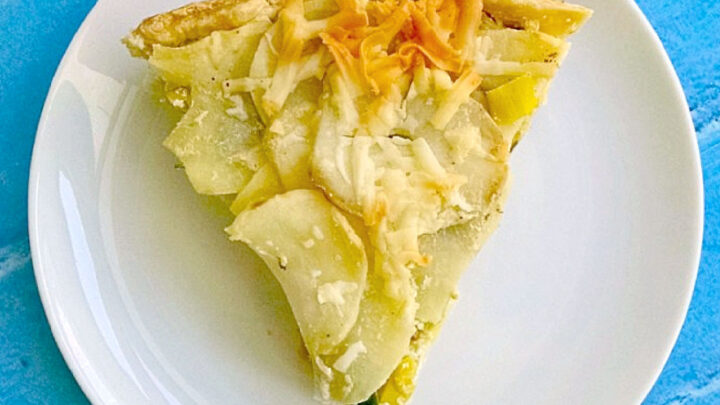 Get ready for a mouth-watering treat with this savory Potato Leek Pie. The perfect combination of buttery crust and creamy filling making it the ultimate comfort food for any occasion. #potatopie #MeatfreeMonday #meatless #PotatoLeekPerfection #SavorySlices #PieGoals #ComfortFoodCravings #SeasonalSavoryEats