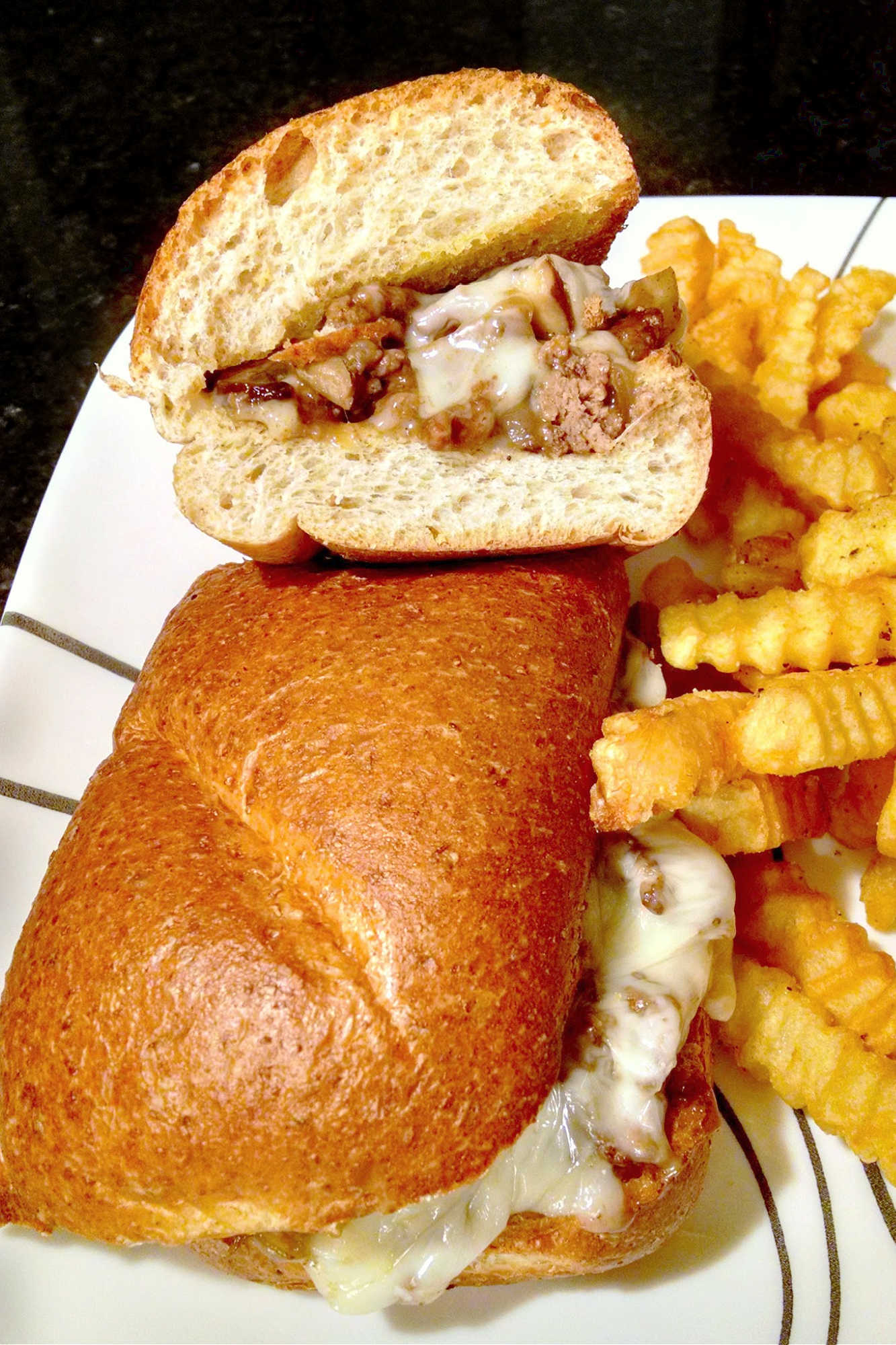 Forget about boring old burgers.  Step up your burger game with a hot hamburger hoagie! Stuffed with satueed ground beef, gooey cheese, and loaded with all your favorite toppings. Trust us, you won't be able to put it down  #HamburgerHeaven #BurgerLoversUnite #HoagieHappiness #FoodieFrenzy #SatisfyYourCravings