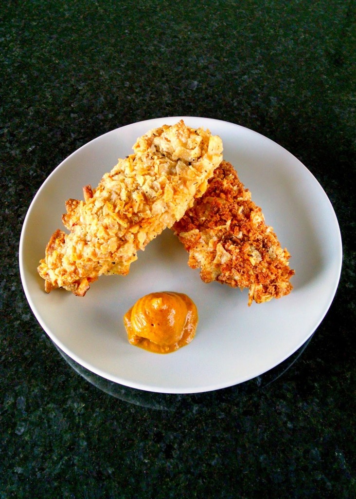 Crunchy potato chips and toasted panko coats tender, juicy chicken strips in these Oven Fried Potato Chicken Tenders! They have epic crunch and amazing flavor.