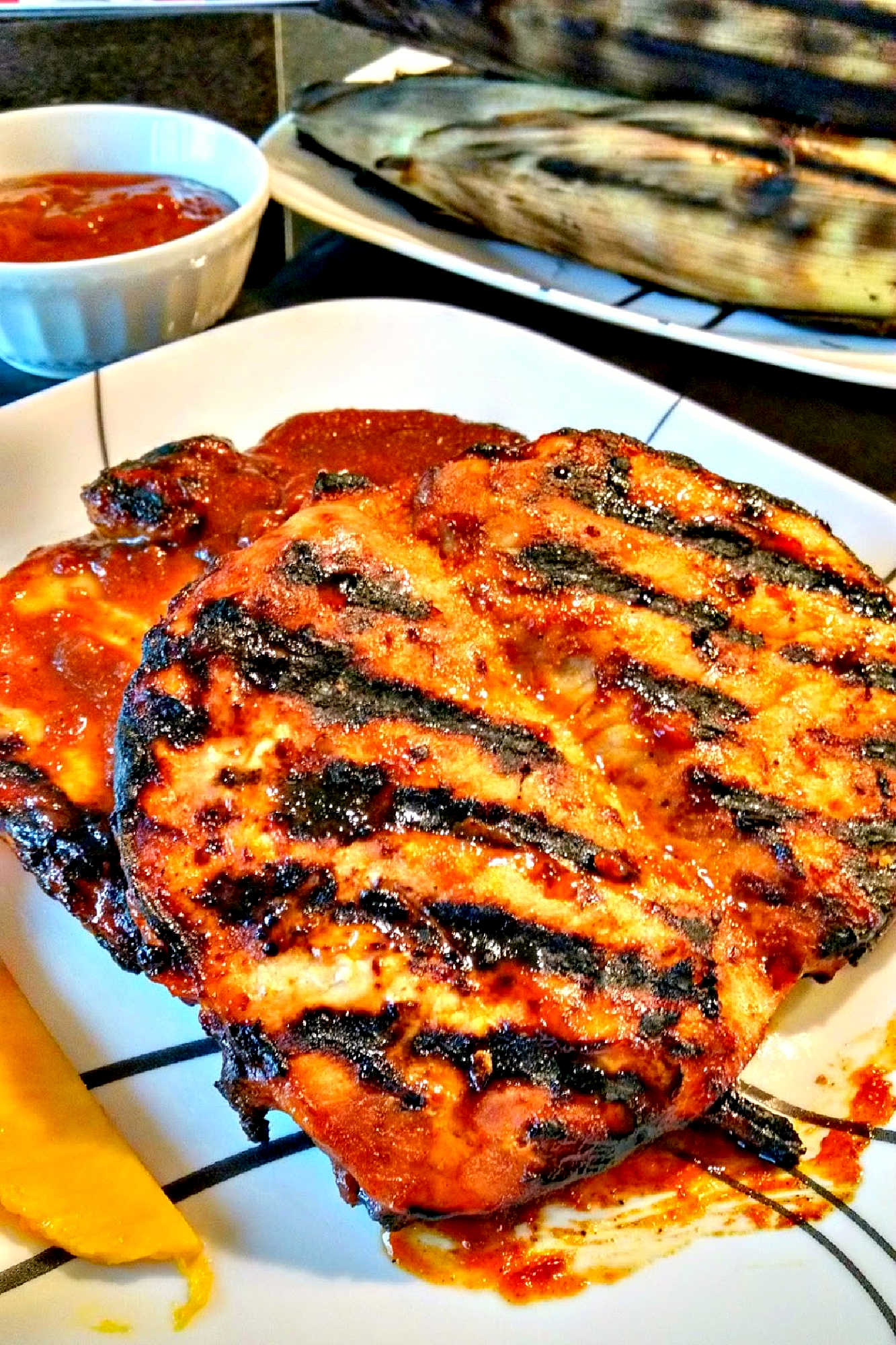 Add a tropical twist to your next BBQ with these mouthwatering Mango Barbecued Pork Chops. Bursting with flavor, they'll be a hit with your family and friends! #MangoBBQPorkChops #TropicalFlavors #GrillMaster #MangoBBQChops #GrillingSeason #PorkChopParadise #TropicalFlavors #FoodieFaves #GrillGoals #FoodieFaves #PorkLoversUnite #SummerEats