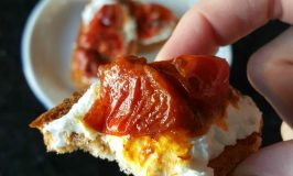 Sweet, saffron and butter flavored tomatoes top tangy labneh in this Pan Roasted Saffron Tomato Crostini with Labneh.
