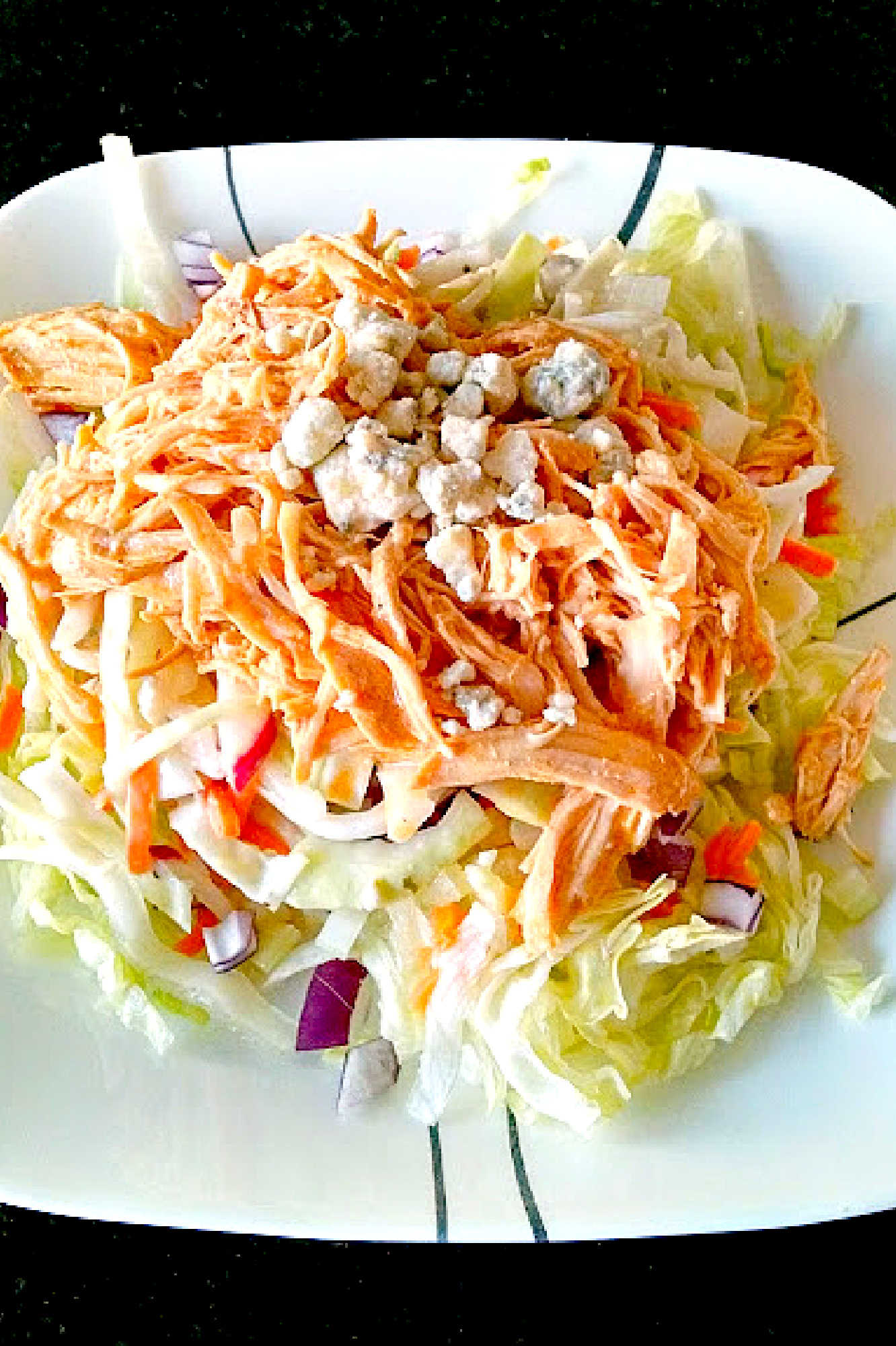 These Buffalo Chicken Tacos with Blue Cheese Radish Slaw will knock your taste buds off! And your family will want these ALL time. Don’t say I didn’t warn you! #OurFamilyTable #BuffaloChicken #chickentacos #bluecheeseslaw #radishslaw #slowcooker #BuffaloChickenTacos #TacoTuesday #GameDay