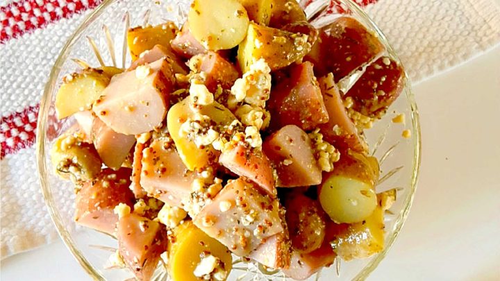 Forget the traditional mayo potato salad and try this irresistible Red White and Blue Cheese Potato Salad! It will satisfy your #FourthofJuly cravings with creamy potatoes and tangy blue cheese. #potatosalad #bluecheese #vinaigrette #nomayopotatosalad