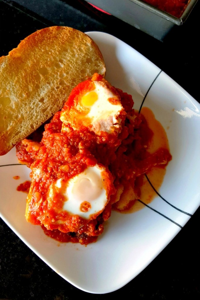 Egg souls trapped in Purgatory red sauce a.k.a. Uova in Purgatorio is a delicious and simple recipe. Making the sauce the day before is a time saver on a busy #MeatlessMonday.