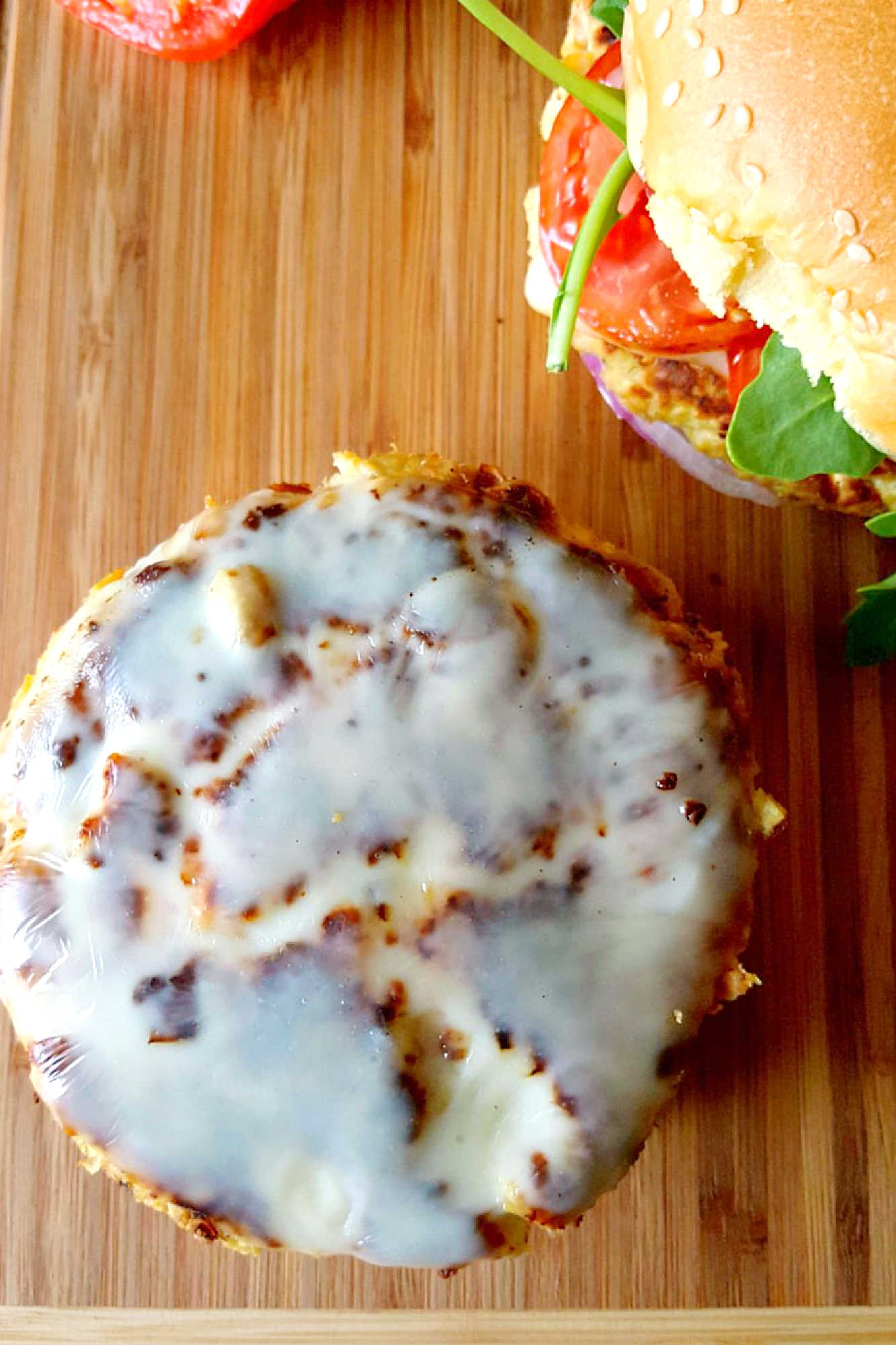 Falafel meets zucchini fritter in this recipe mash up. Courgette and Ricotta Falafel Burgers are healthy, delicious, and perfect for a meatfree meal! #FalafelBurgers #VegetarianEats #HealthyBurgerOptions #MeatlessMonday #CourgetteRicottaCombo
