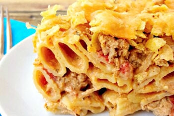 Dinner just got extra cheesy! This Queso Con Carne Casserole layers seasoned turkey, tender rigatoni, tomatoes with green chiles, creamy queso, and a crunchy tortilla chip topping. Serve it bubbling hot for family dinner, potluck night, or game day. 🧀🌶️ #OurFamilyTable #NachoPastaLove #CheesyGoodness #PastaPartyTime #FoodieFiesta #EasyEats #QuesoConCarne #CheesyCasserole #EasyDinner #PastaBake #TexMexFood #ComfortFood #PotluckRecipes
