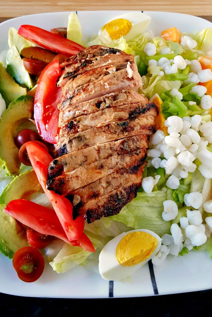 Upgrade your lunch game with the Alabama Cobb Salad. Packed with cool greens and grilled chicken with Alabama white sauce, it's the perfect choice for a summer dinner. #SaladGoals #HealthyEats #SouthernSaladSensation #DeliciousAndNutritious #CobbCravings
