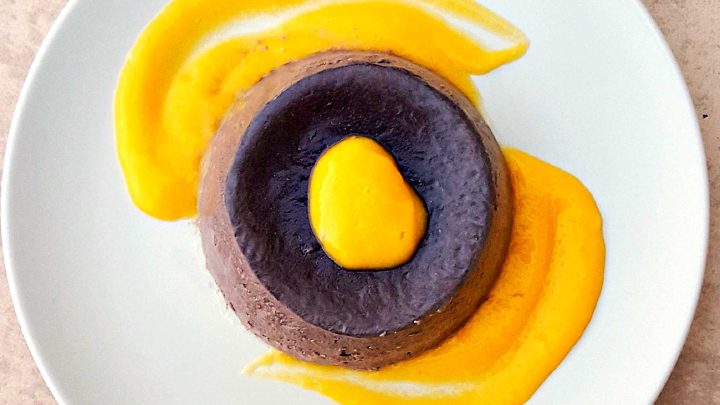 🍫 Dark Chocolate Panna Cotta + 🥭 Mango Coulis = Heaven! #DarkChocolatePannacotta #MangoCoulisDelight #DessertGoals #ChocoholicIndulgence #FoodieFridays #chocolateloversunite #dessertgram #pannacottaperfection #mangomadness #chocolateloverdelight