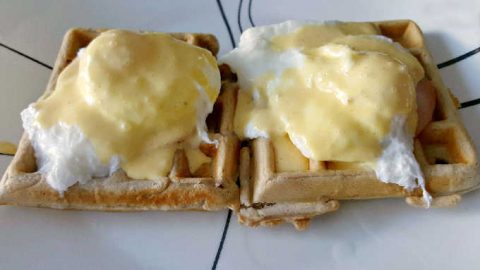 Savory and hearty buckwheat waffles are topped with delicious poached eggs and silky hollandaise. This Buckwheat Waffles Benedict for #WaffleWeek2015 is an interesting spin on your traditional benedict dish.