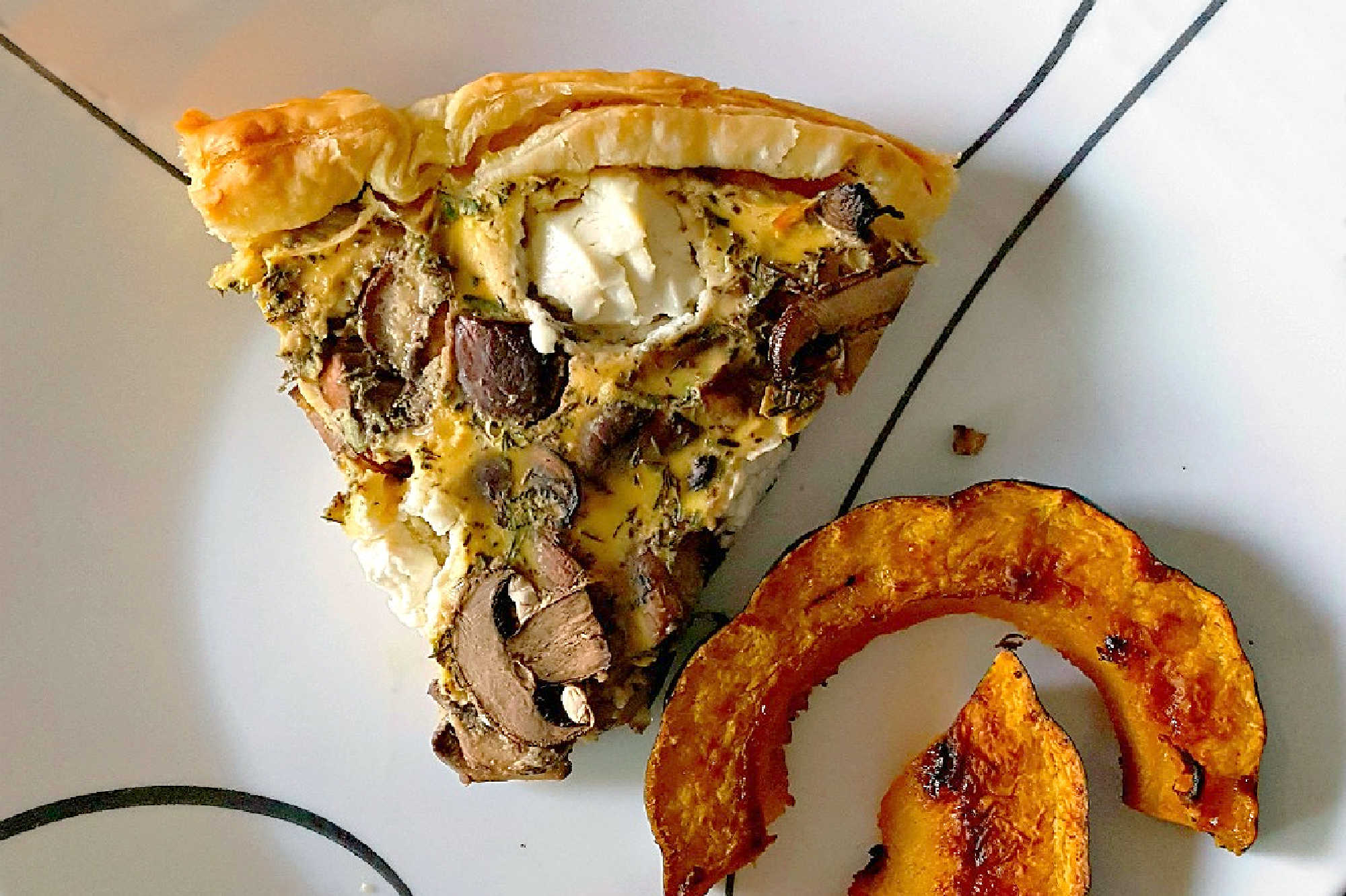 Searching for a flavorful centerpiece? These layers of flaky pastry, earthy mushrooms, and creamy goat cheese come together for a savory tart that's perfect for brunch or a light lunch. Save this recipe for your next meal inspiration. #MushroomCheeseTart #SavoryTart #GoatCheeseObsessed #MushroomLover #FarmToFork #mushroomtart #goatcheeselove #savorytreats #vegetariantart #gourmetfoodie