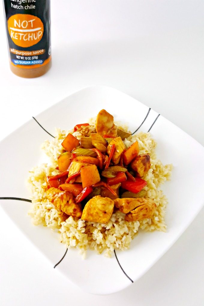Both sweet and tangy, this #FreshTastyValentines recipe for Tangerine Chicken Stir-Fry is healthy and quick, It uses @NotKetchup Tangerine Hatch Chili sauce, lean chicken breast, and tasty vegetables for this delicious dinner.