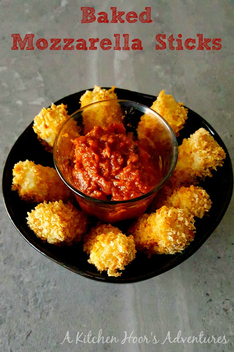 Perfectly crispy, melty, and stringy; these Baked Mozzarella Sticks have all the flavors of their fried cousins, but without all the oil and fat. #FreakyFriday @AKitchenHoor