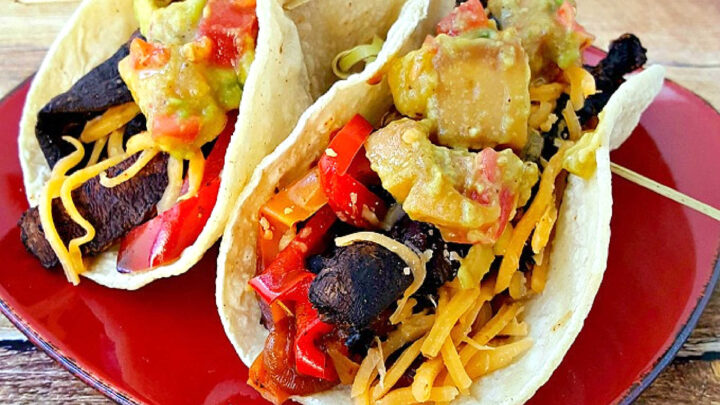 Sheet pan portobello fajitas bring bold flavors and easy clean-up to your table. Enjoy a savory mix of roasted veggies and mushrooms ready in one simple step. #sheetpanfajitas #portobellos #plantbasedeats #easydinnerideas #weeknightmeals