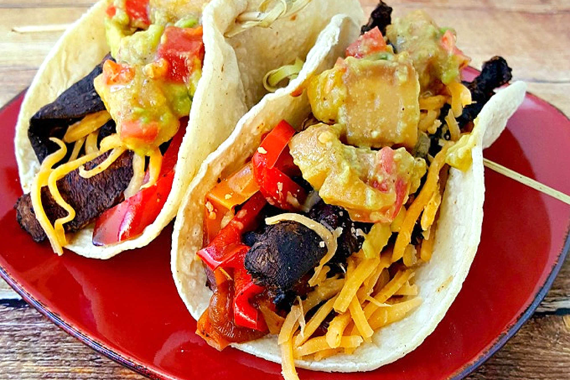 Sheet pan portobello fajitas bring bold flavors and easy clean-up to your table. Enjoy a savory mix of roasted veggies and mushrooms ready in one simple step. #sheetpanfajitas #portobellos #plantbasedeats #easydinnerideas #weeknightmeals