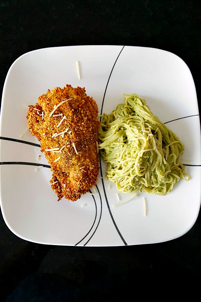 I'm addicted to my oven fried chicken! Especially when it has delicious pesto flavor. My Pesto Crusted Oven Fried Chicken is your next family favorite fried chicken.