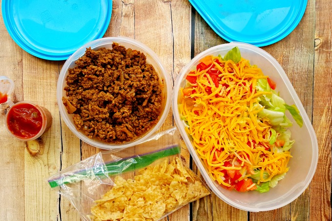 With a little prep and a large bowl of lettuce, you can have your taco salad and eat it, too! This nostalgic Picnic Taco Salad pleases the whole crowd this summer!